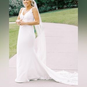 Lace train fit and flare wedding dress